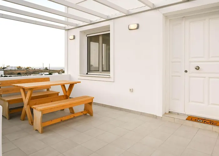 Santorini's Old Mill Serene Getaway By Pori Casa de Férias *