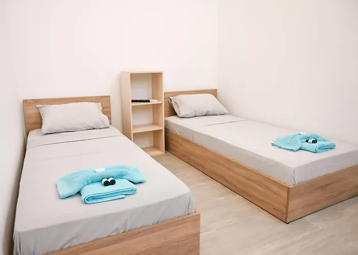 Santorini's Old Mill Serene Getaway By Pori Casa de Férias