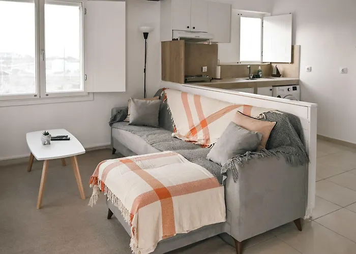 Santorini's Old Mill Serene Getaway By Pori Vourvoúlos