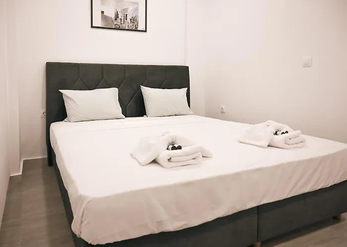 Santorini's Old Mill Serene Getaway By Pori